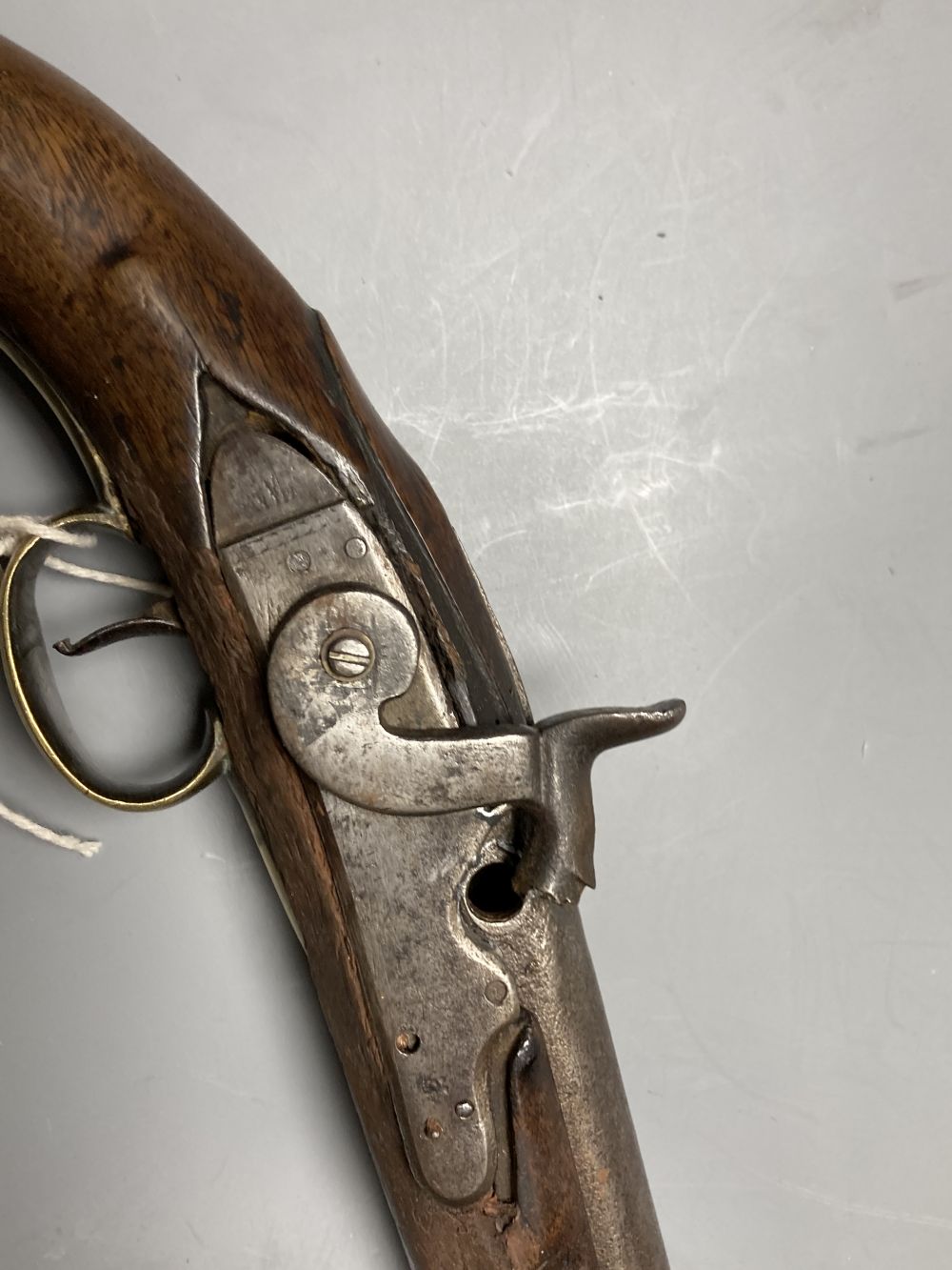A 19th century percussion cap pistol (incomplete), length 39cm